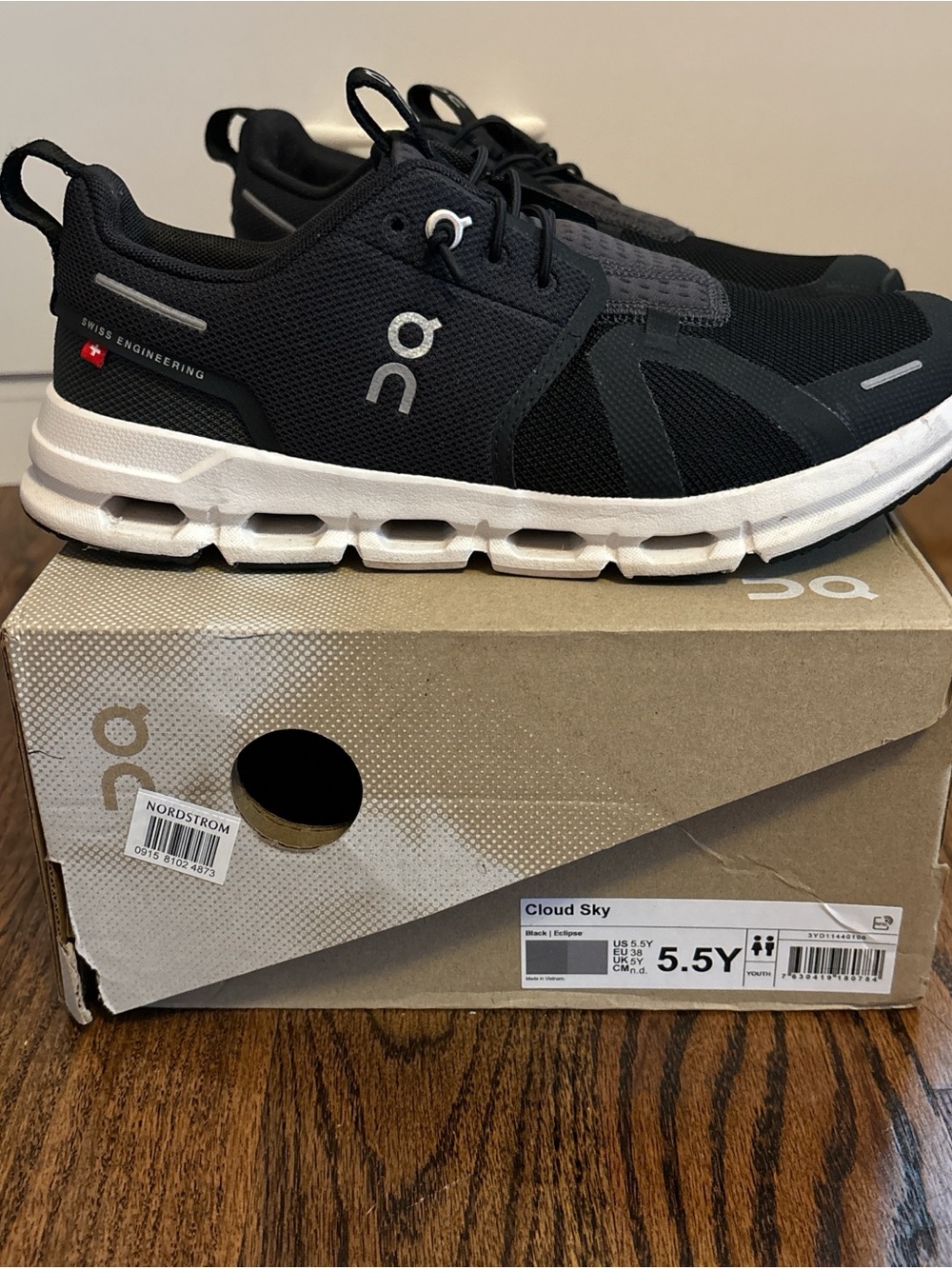On Running Cloud Sky Athletic Sneakers in Black and White